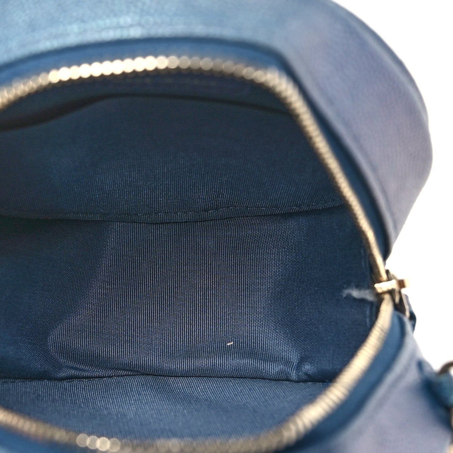 Iridescent Caviar Quilted Round Clutch With Chain Blue