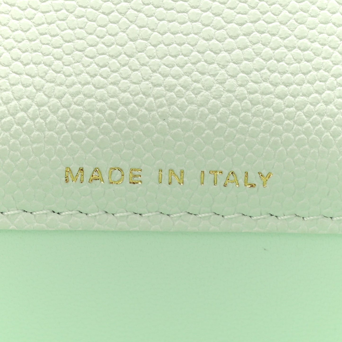 Caviar Quilted Retro Twist Top Handle Clutch Light Green