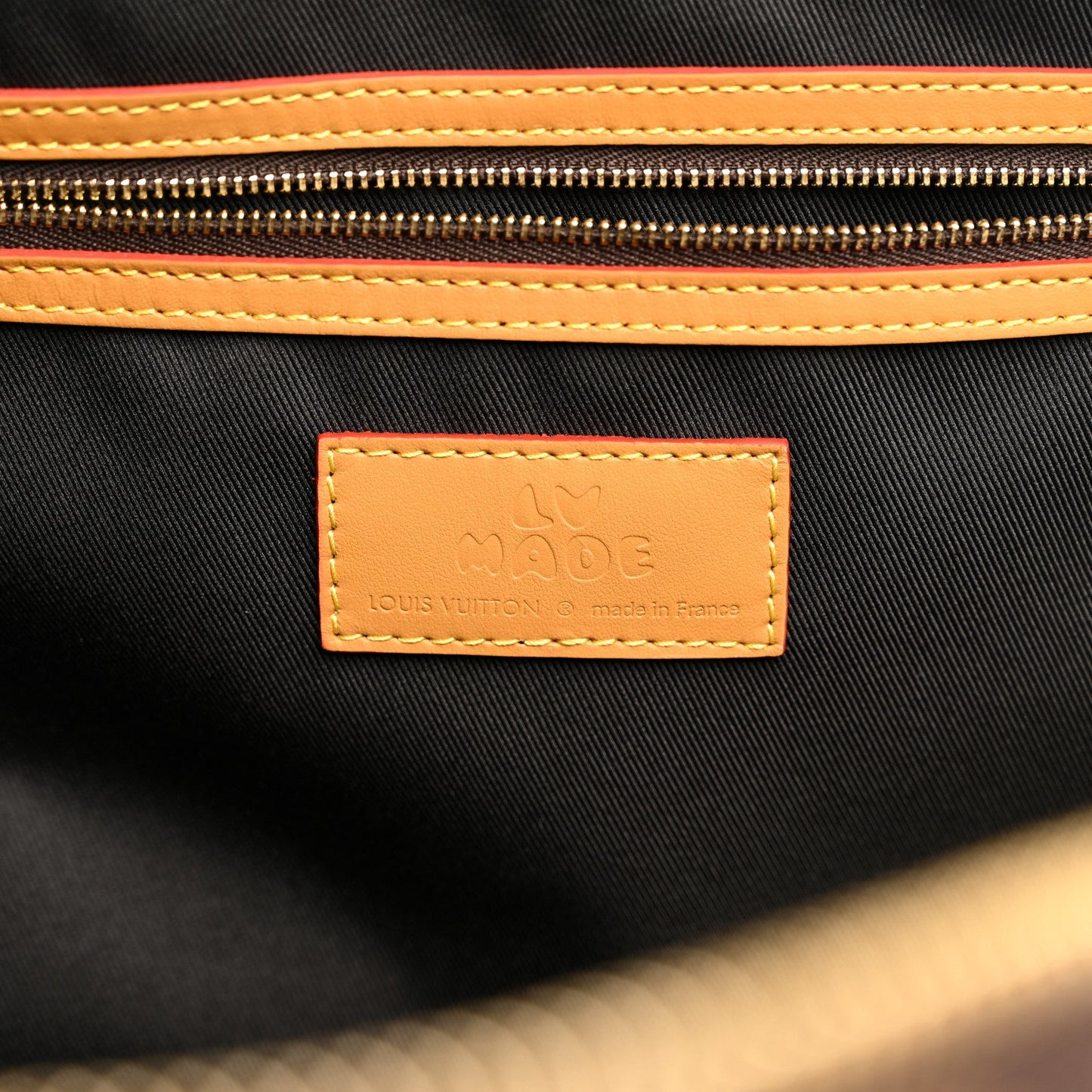 X NIGO Reverse Monogram Stripe Keepall Bandouliere 50 Brown