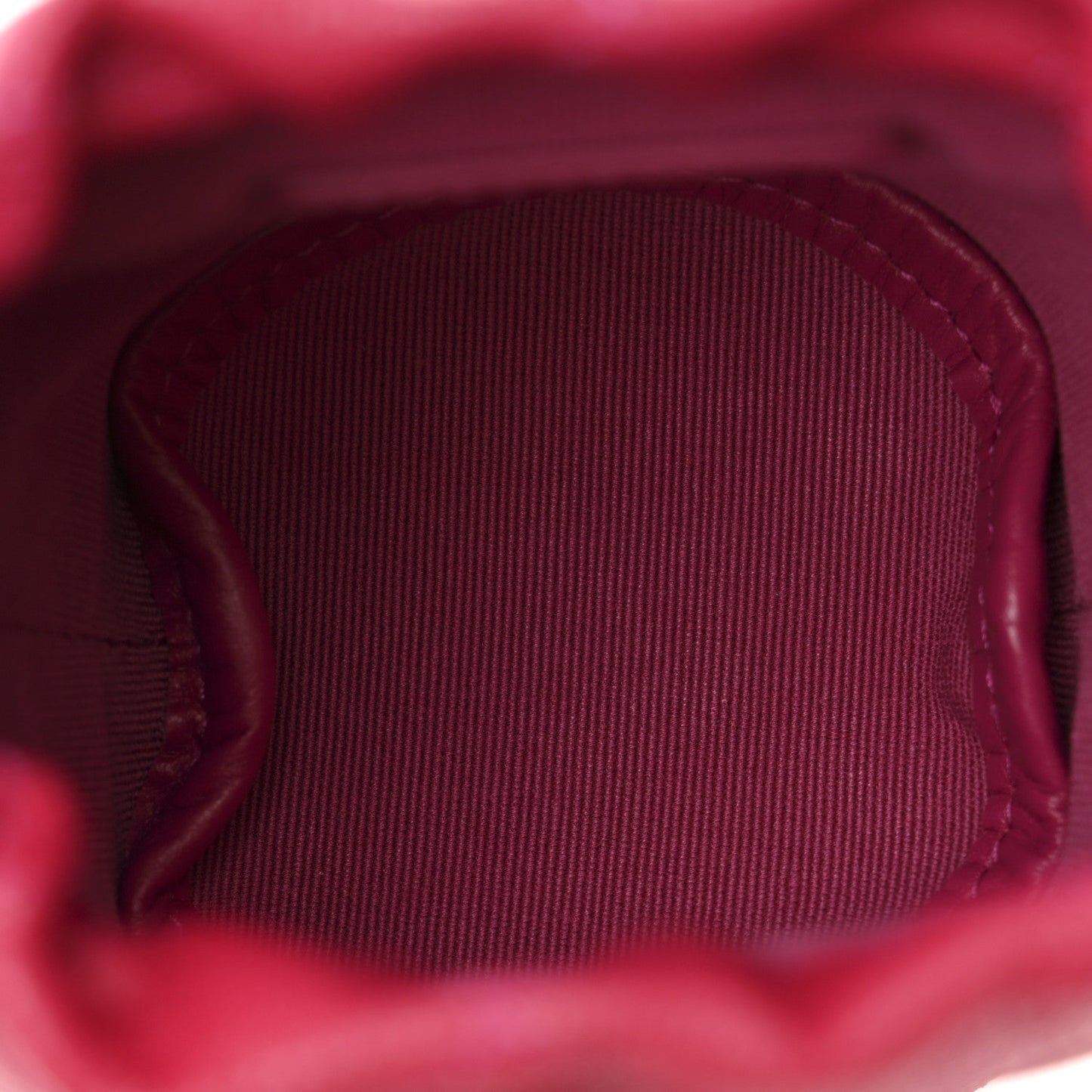 Caviar Quilted Twist Your Buttons Mini Bucket Bag Fuchsia