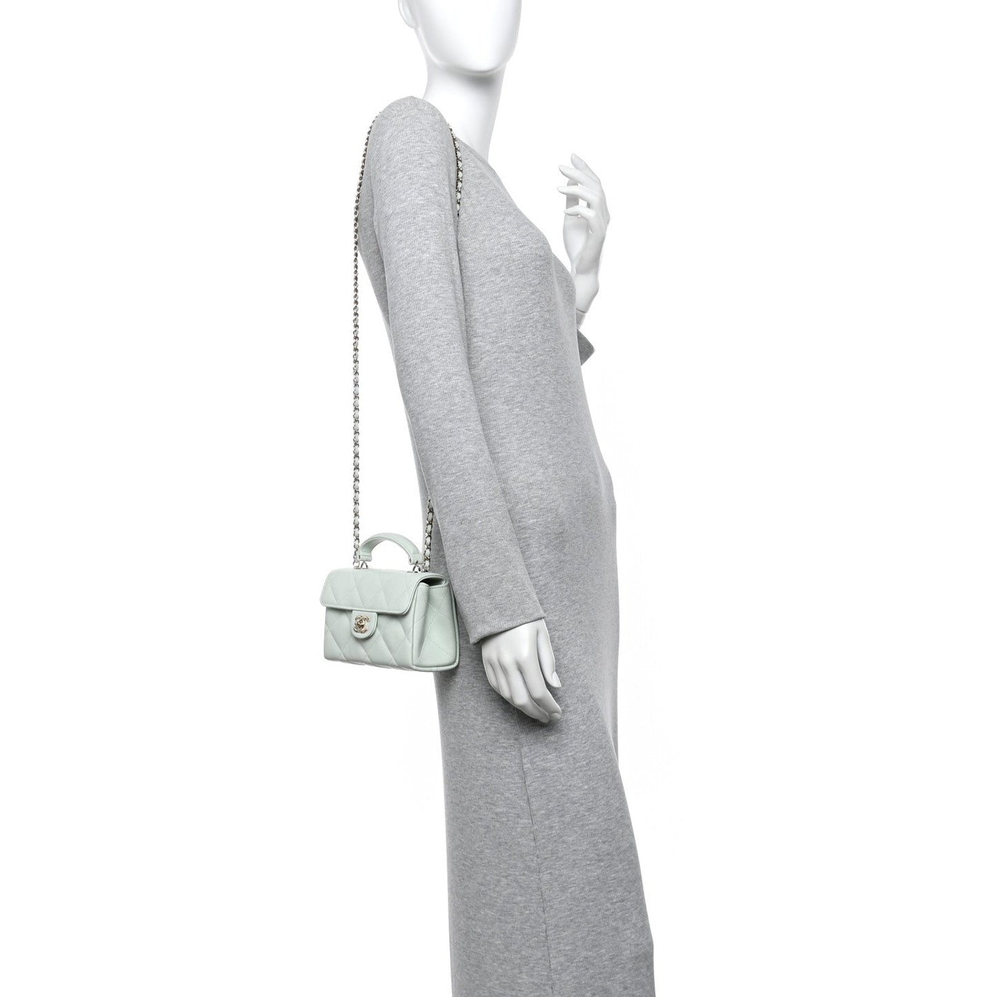 Caviar Quilted Retro Twist Top Handle Clutch Light Green