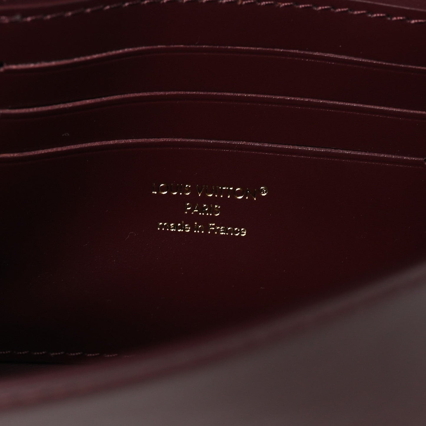 Calfskin LV Wallet On Chain Capucines Garnet